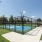 game court with surrounding green landscaping