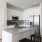 kitchen with an island, modern appliances and spacious counter-space
