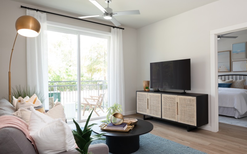 living room at broadstone baybrook apartments in webster