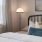 lamp near a bed