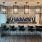 clubhouse with bar stools in front of an island bar