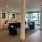 clubhouse with soft seating and pool in the background
