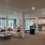 clubhouse with soft seating and pool in the background